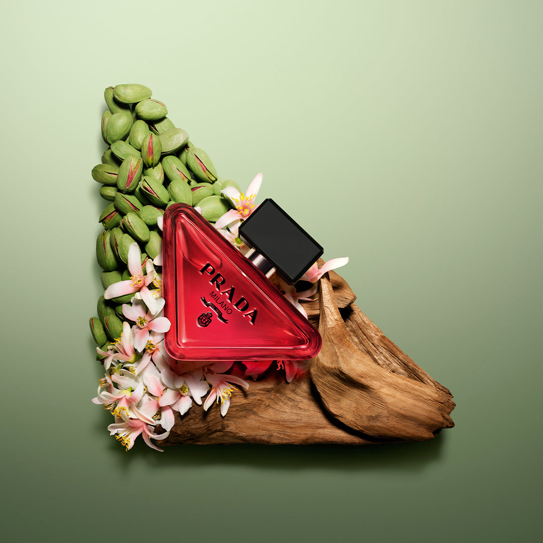 Prada Paradoxe Radical Essence Parfum 90mL - fragrance lifestyle with pistachios, flowers and wood